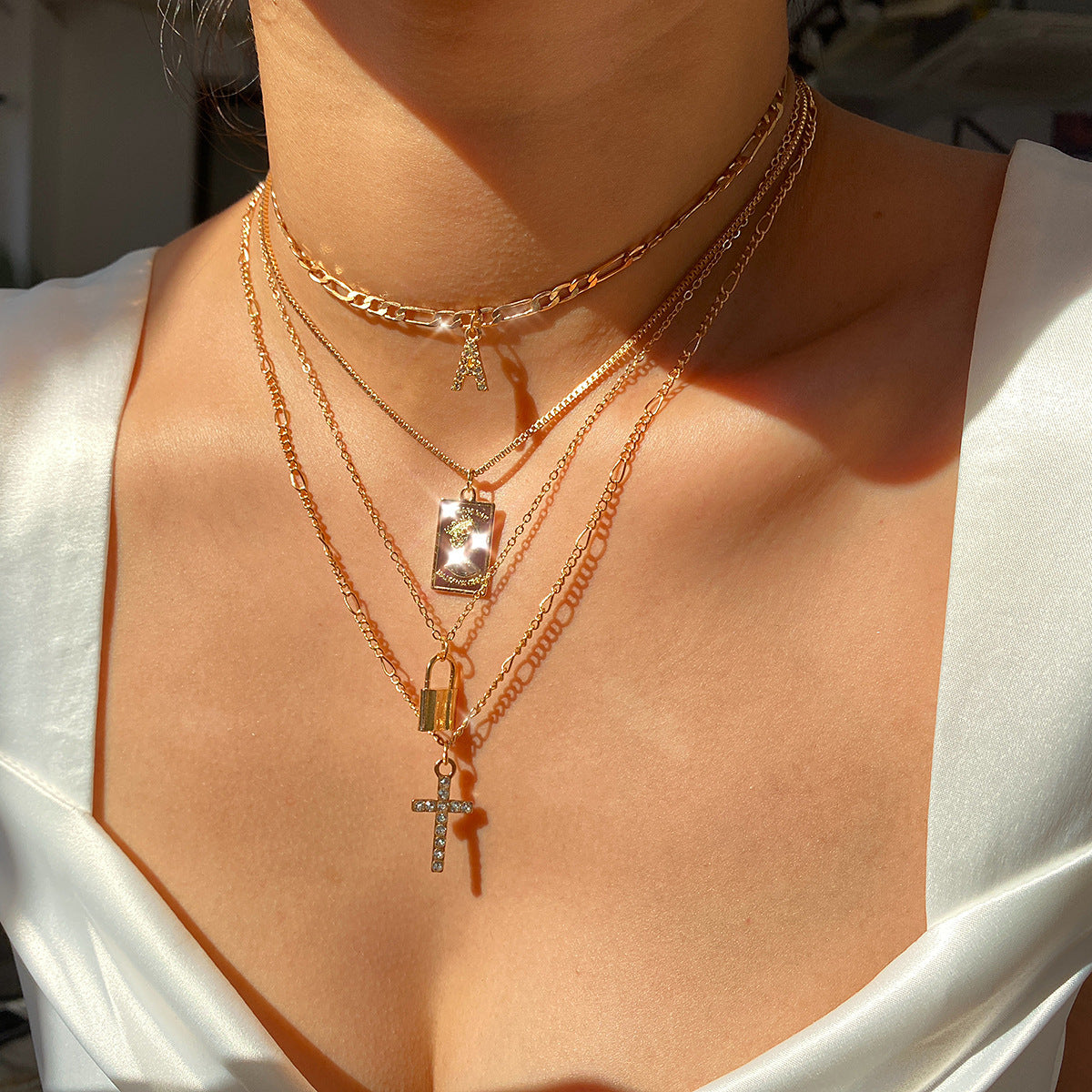 Diamond cross ornament necklace